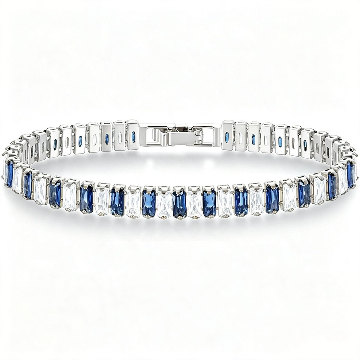 Silver Tone tennis bracelet with alternating blue and clear rectangular stones and a clasp.