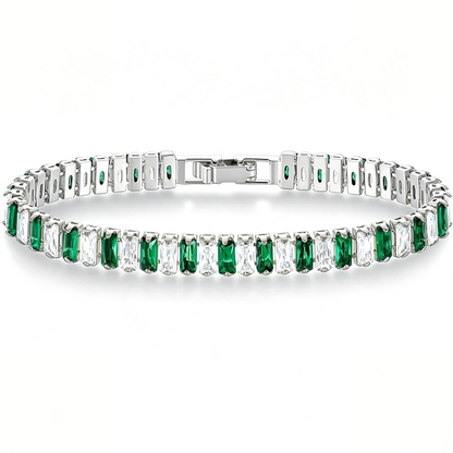 Silver Tone tennis bracelet with alternating green and clear rectangular stones and a clasp.