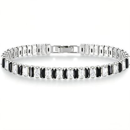 Silver Tone tennis bracelet with alternating black and clear rectangular stones and a clasp.