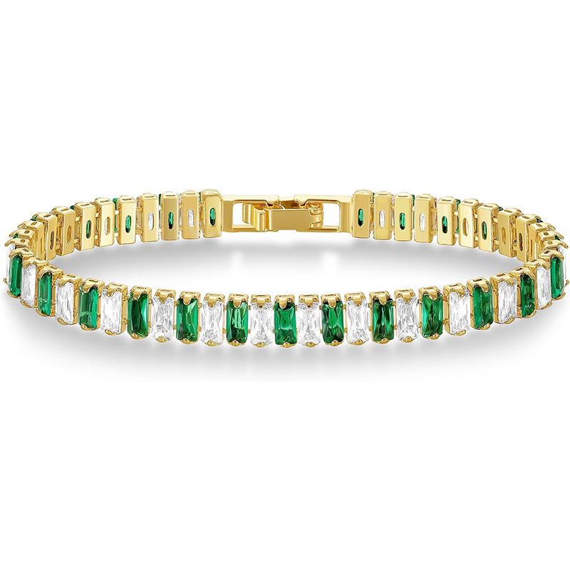 Gold Tone tennis bracelet with alternating green and clear rectangular stones and a clasp.